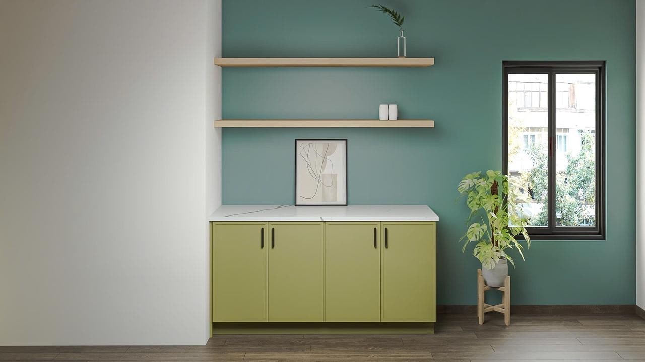A 3D render of an olive green cabinet with a white marble top against a teal wall, with light wood floating shelves above.